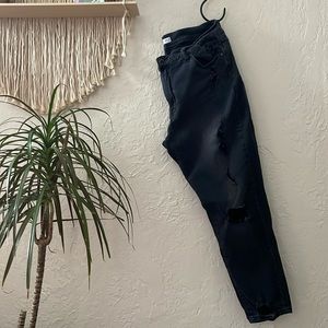 Washed out black distressed skinny jean